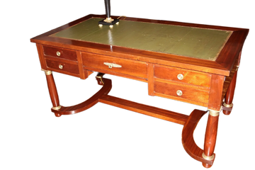 Scrivania Impero francese di inizio 1900 in legno di mogano con piano in pelle