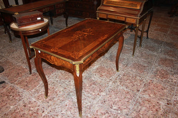 French Louis XV style writing table from 1800 with bronzes and rich inlay motifs