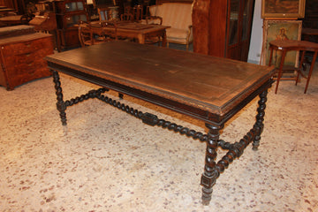 Large French table from the early 19th century in walnut wood with carvings