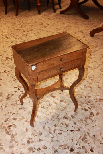 Small Directoire style work table in 19th century walnut wood