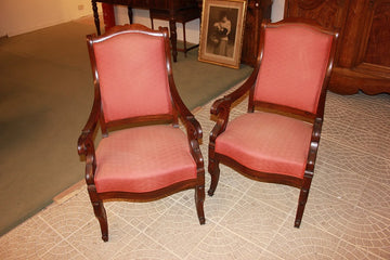 Pair of Directoire style armchairs in mahogany wood and mahogany feather, 19th century