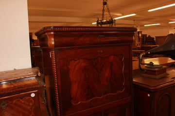 Northern European Biedermeier style secretaire desk chest from the second half of the 19th century in mahogany wood