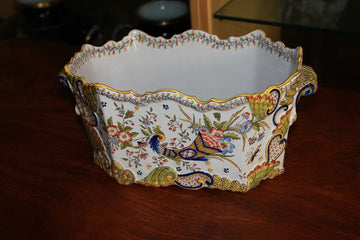 French plant holder centerpiece in porcelain richly decorated with a floral motif