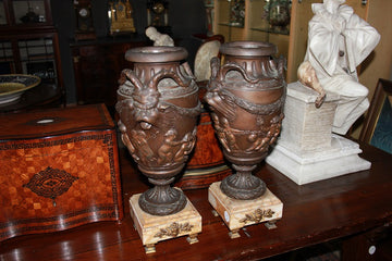 Pair of large antimony vases with yellow marble bases, 19th century