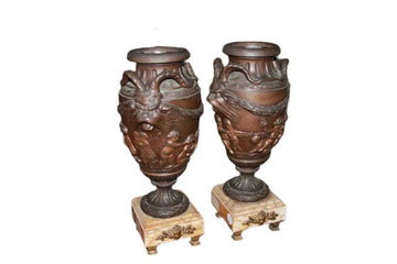 Pair of large antimony vases with yellow marble bases, 19th century