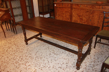Large rustic French table from the early 19th century in chestnut wood