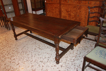 Large rustic French table from the early 19th century in chestnut wood