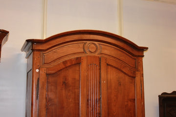 French 2-door wardrobe from the early 1800s Provençal style in cherry wood