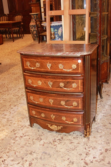 Small French Regency style chest of drawers with 4 drawers, marble top and gilded bronzes