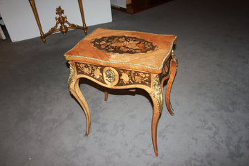 French Louis XV style dressing table in bois de rose with floral inlays on an ebony background, 19th century