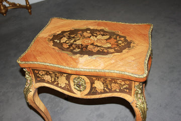 French Louis XV style dressing table in bois de rose with floral inlays on an ebony background, 19th century