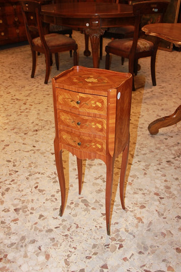 Pair of richly inlaid French bedside cabinets from the late 1800s in Louis XV style