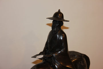 French sculpture depicting a wise oriental peasant at the turn of the 1800s