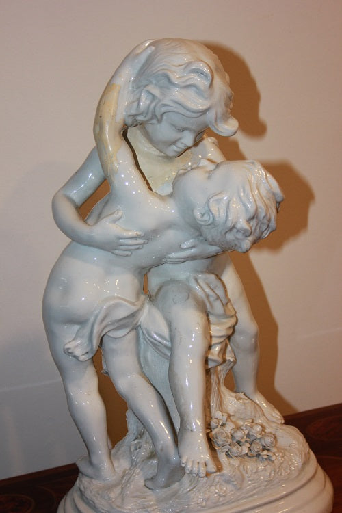 Gruppo scultoreo in ceramica Coppia di Amorini Putti del 1800
