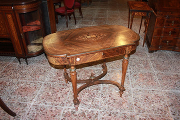 French Louis XVI style rosewood center table from the 1800s with writing table