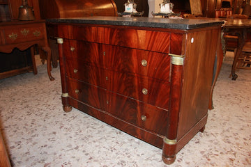 Empire-style mahogany chest of drawers with mahogany feather veneer and 19th-century bronzes