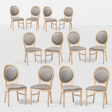 Set of 24 Carved and Painted Wooden Chairs, 20th Century: Elegance and Refinement