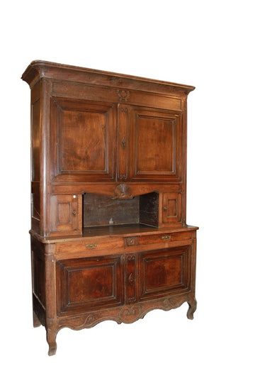 Large majestic Cupboard from the early 19th century, French Provencal style in walnut wood with carvings