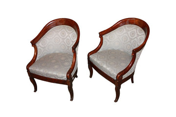 Pair of 19th century Directoire style tub armchairs in mahogany and mahogany feather