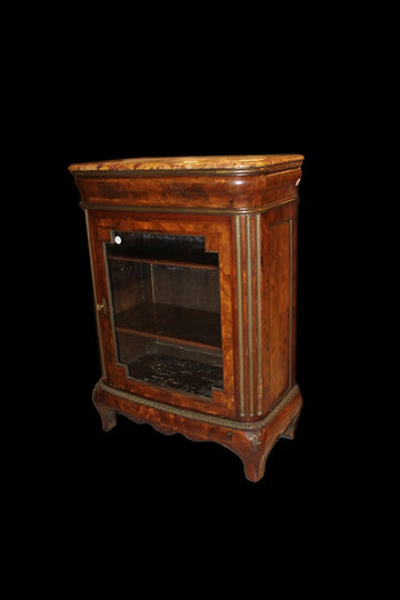 Low French display cabinet from the mid 1800s in Louis XV style with brass and old stain marble top