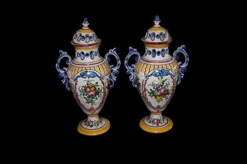 Pair of French vases with lids in white ceramic richly decorated with a floral motif