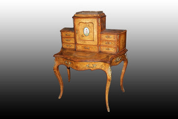 Bonheur du jour Louis XV style writing table from the mid-1800s with Sevres porcelain medallion