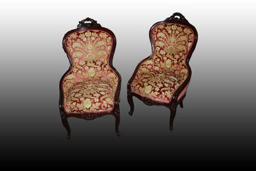 Pair of Louis Philippe armchairs without armrests from the 19th century in rosewood with carvings