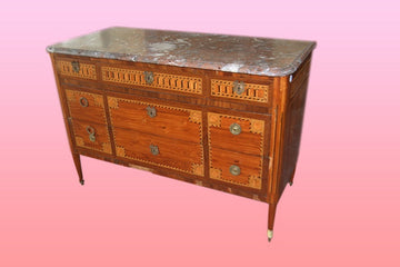 French Louis XVI style chest of drawers from the early 19th century with marble top