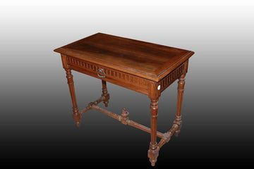 French writing table from the late 1800s and early 1900s in walnut wood, 17th century style