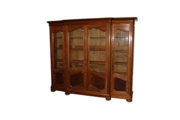 Large French 4-door bookcase from the early 1900s in walnut wood