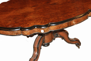 Louis Philippe table in walnut and walnut briar with bevelled top with 19th century ebonized wood edge