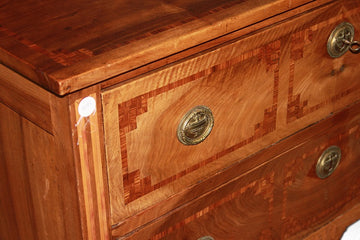 French chest of drawers from the early 19th century, Louis XVI style in walnut wood with geometric inlays and bronzes