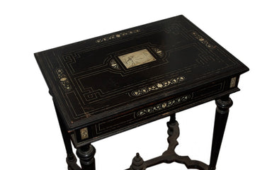 Italian Lombardo side table from the early 1800s in ebonized wood with pyrographed ivory inlays