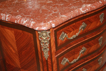 Transition style chest of drawers from the second half of the 19th century with red French marble and bronzes 