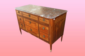French Louis XVI style chest of drawers from the early 19th century with marble top