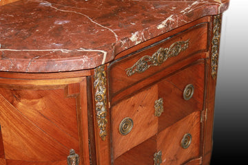French Louis XVI style chest of drawers with a bevelled shape from the 1800s with marble and bronze