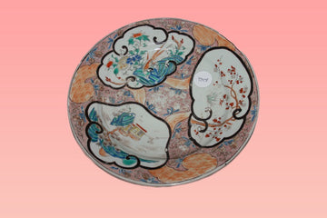 Chinese porcelain plate richly decorated with three vignettes