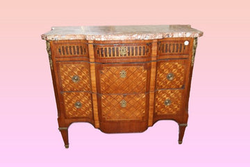 Antique French chest of drawers from the 1800s inlaid and with marble