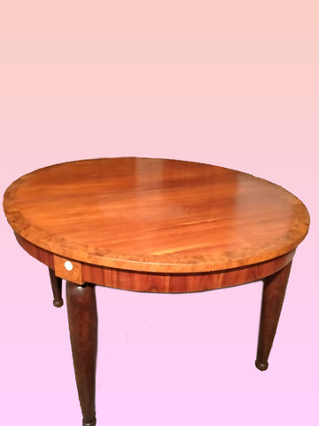 Antique Louis XVI oval extendable table from 1900 in cherry and elm