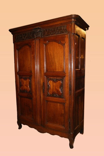 Antique large French wardrobe from 1700s in cherry wood with carvings