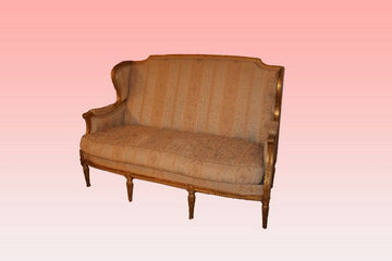 Antique French gilt Louis XVI style sofa from 1800