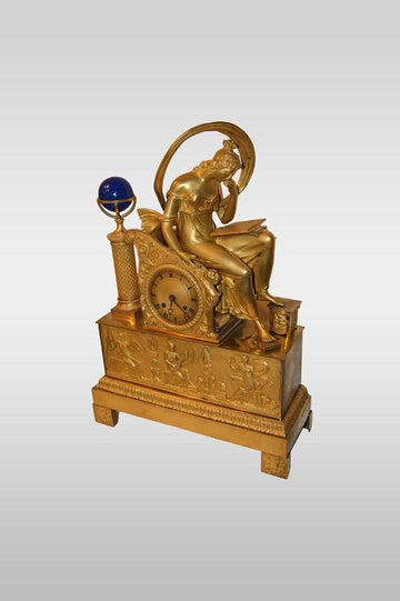 Antique Empire mantel clock from 1800 with French gilt bronze lady
