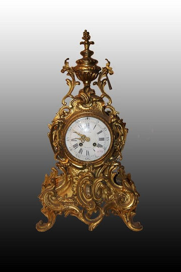19th century French Louis XV style mantel clock in bronze