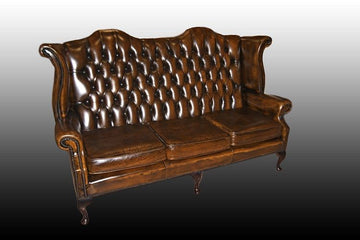 Antique Chesterfield sofa from 1950 with green leather 3-seater ears