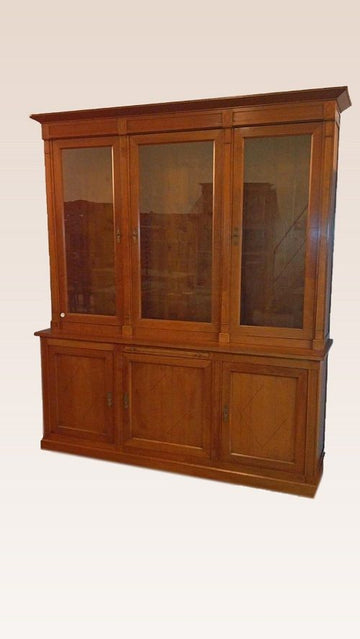 Antique large French bookcase from the early 1900s in cherry wood display case