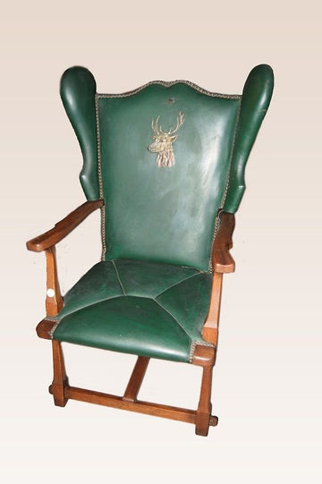 Antique 19th century English hunting lodge armchair in leather with deer
