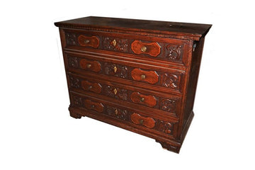 Antique Italian chest of drawers from the 1600s in Renaissance style walnut
