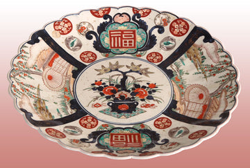 Antique Japanese Imari porcelain plate from the 1800s with decorations