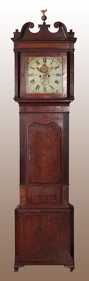 Antique English column clock from 1800 in mahogany feather, signed