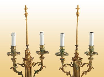 Pair of antique electrified two-light candlesticks in gilded bronze